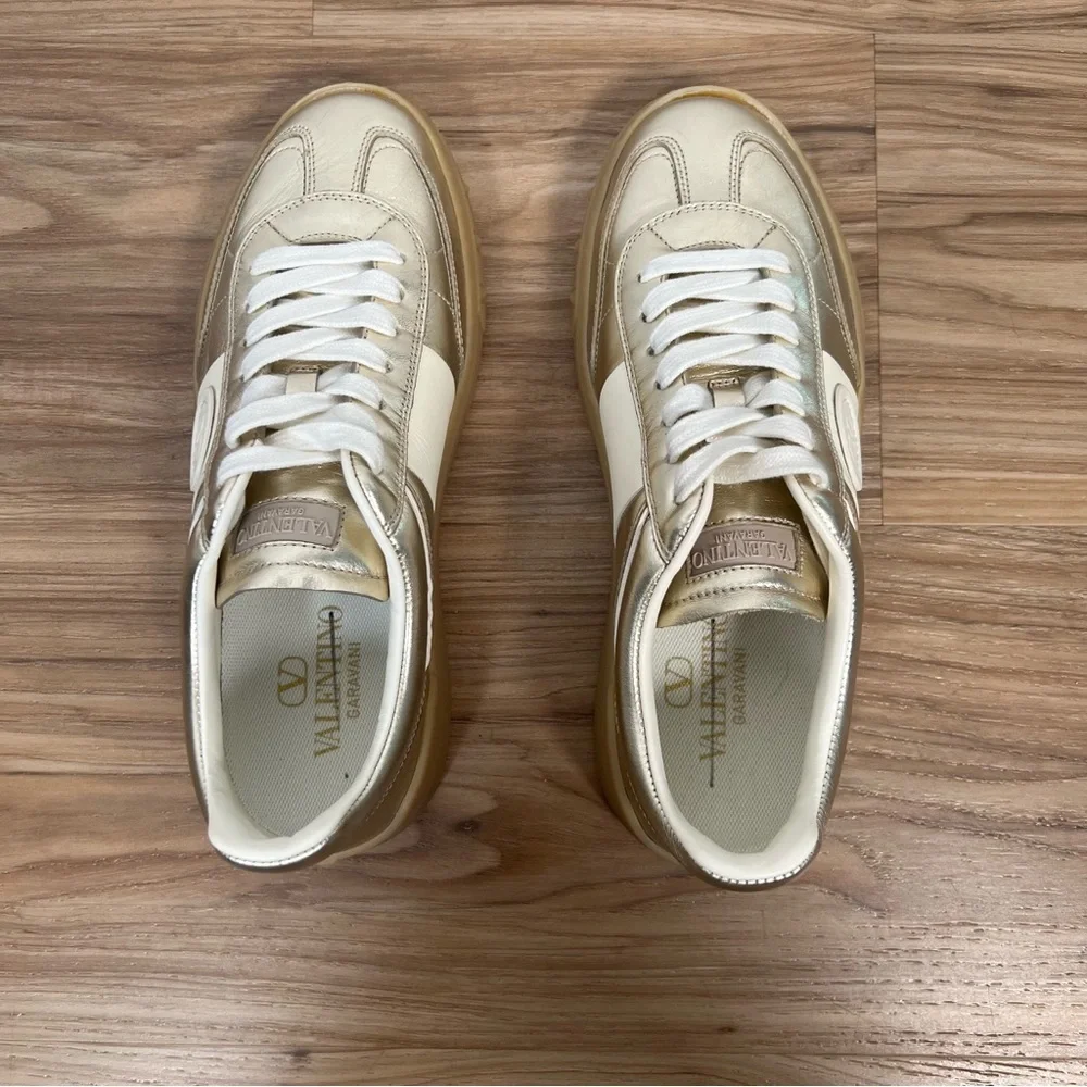 Valentino Garavani Women’s Upvillage Trainer Sneakers in Laminated Calfskin Gold